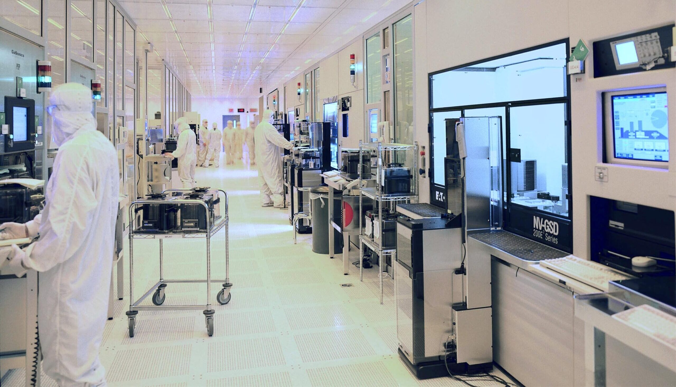 Fab workers in a semiconductor facility