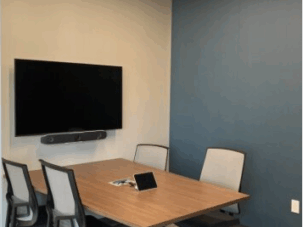 Huddle room with ACT and acoustical wall panels