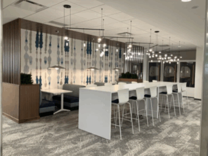 Open gathering space with privacy booths